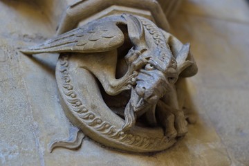 Image of a stone dragon on the wall of a church in London, United Kingdom