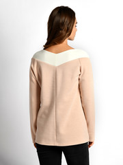 Wall Mural - Young beautiful woman posing in new casual grey blouse sweater backside rear view