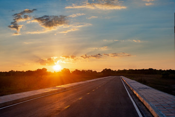 Empty asphalt road blue sky and sunset backgroung with copy space