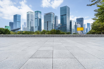 Panoramic skyline and buildings with empty square floor.