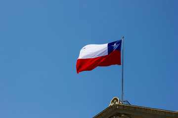 background,banner,blue,capital,capital city,capitol,chile,chile flag,clear day,clear sky,color,country,culture,diversity,downtown,emblem,equator,fabric,flag,geography,high,independence,international,l