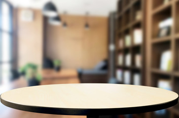 Wall Mural - Wooden board empty Table Top And Blur Interior over blur in coffee shop Background, Mock up for display of product