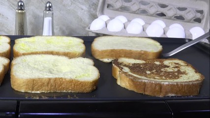 Sticker - Turning french toast on an electric grill