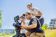 © galitskaya - a cameraman operator discuss the shooting process with a director and dp
