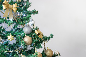 A decorated Christmas tree on white background