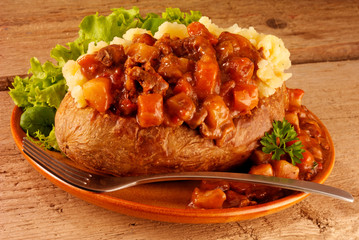 Wall Mural - BAKED POTATO WITH BEEF STEW