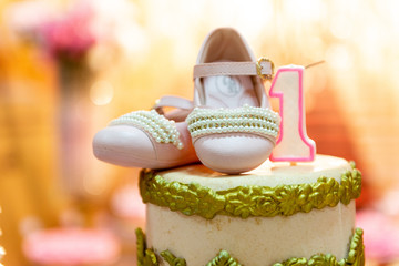 Female footwear, on party background with various details. First shoe used.