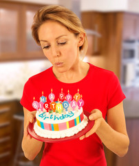 Canvas Print - GIRL WITH BIRTHDAY CAKE BLOWING OUT CANDLES