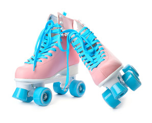 Wall Mural - pair of bright stylish roller skates on white background