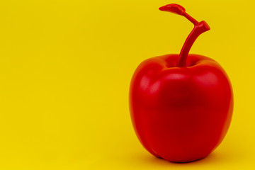 Wall Mural - red Apple on yellow background