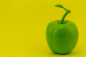 Wall Mural - green Apple on yellow background