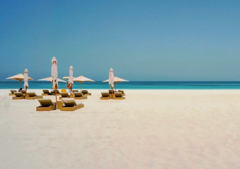 Wall Mural - Beautiful beach with an umbrella on the shore of the Arabian Gulf. Dubai. 