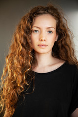 Wall Mural - Portrait of curly hair woman