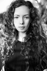 Wall Mural - Portrait of curly hair woman