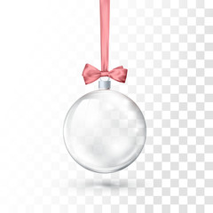 Wall Mural - glass transparent christmas ball hanging on pink ribbon with bow. xmas glass ball on transparent bac