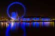 The London Eye (blue) at night