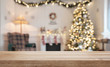 © rangizzz - Empty wooden table over defocused christmas background with copy space