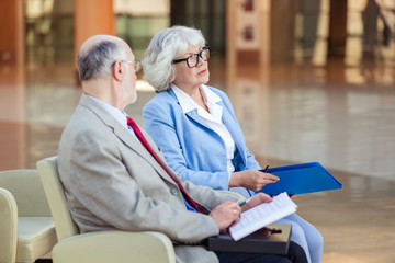 Senior couple at meeting