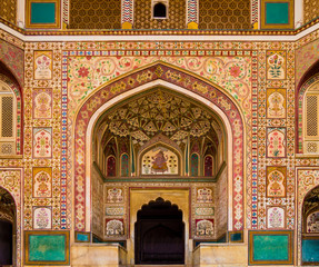 Stunning facade of Ganesh Pol entrance in Amber Fort Palace, Jaipur, Rajasthan, India
