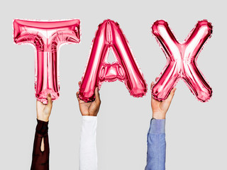 Canvas Print - Hands showing tax balloons word