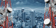 © SasinParaksa - Networking and internet network technology in the city. Telecommunication towers with cityscape and networking lines
