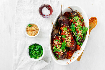 Wall Mural - Healthy vegetarian food Vegetarian baked stuffed eggplant lentils top view