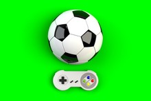 Video Game Console GamePad. Gaming Concept. Top View Retro Joystick With Soccer Ball Isolated On Green Background, 3D Rendering