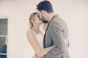 Portrait of groom with bride kissing and hugging together on white background,Happy and smiling in engagement day