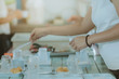 © JinnaritT - Woman prepare snack and beverage for conference lunch break