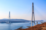 Fototapeta Na sufit - Suspended cable Russian bridge from the mainland of the Far-Eastern city of Vladivostok to the Russky island