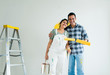 © Rawpixel.com - Couple renovating their new house by painting the walls