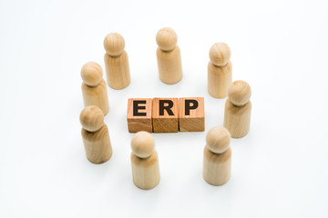 Wall Mural - Wooden figures as business team in circle around acronym ERP Enterprise Resource Planning