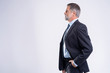 © opolja - Happy satisfied mature businessman looking at camera isolated on white background.