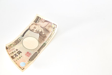 Closeup of Japanese yen notes coin