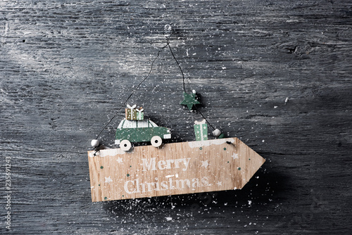 Fotografia, Obraz text merry christmas in a wooden signboard