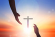 Jesus helping hand concept：World Peace Day Help hand on sunset background