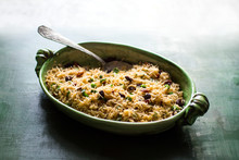 Pilaf With Raisins And Almonds Served In Casserole
