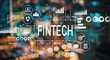 © Tierney - Fintech with blurred city abstract lights background