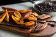 © Andrew Scrivani - Close up of roasted banana slices on cooling rack