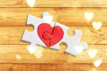 Poster - Puzzle pieces with painted red heart