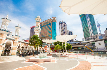 Wall Mural - Masjid Jamek mosque and city skyline Kuala Lumpur