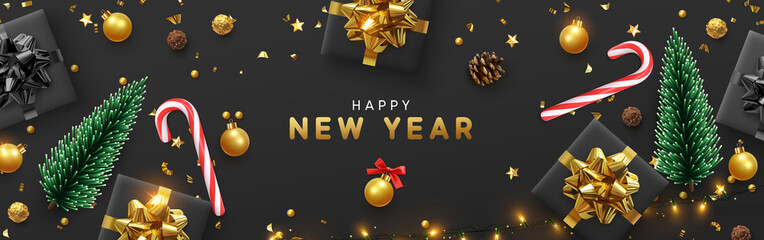 Happy New Year banner, Xmas sparkling lights garland with gifts box and golden tinsel. Horizontal Christmas posters, greeting cards, headers, website. Objects viewed from above. Flat lay, Top view