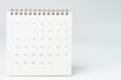 © Nuthawut - Clean white desktop calendar on white table with copy space, using for schedule appointment or year plan concept