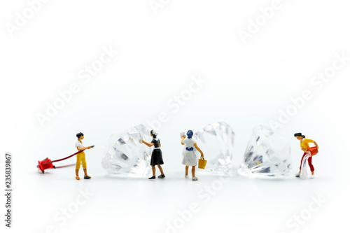 Fotografie, Obraz Miniature people : Maid or Housewife cleaning on diamond.