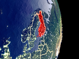 Wall Mural - Satellite view of Finland at night with visible bright city lights. Extremely fine detail of the plastic planet surface.