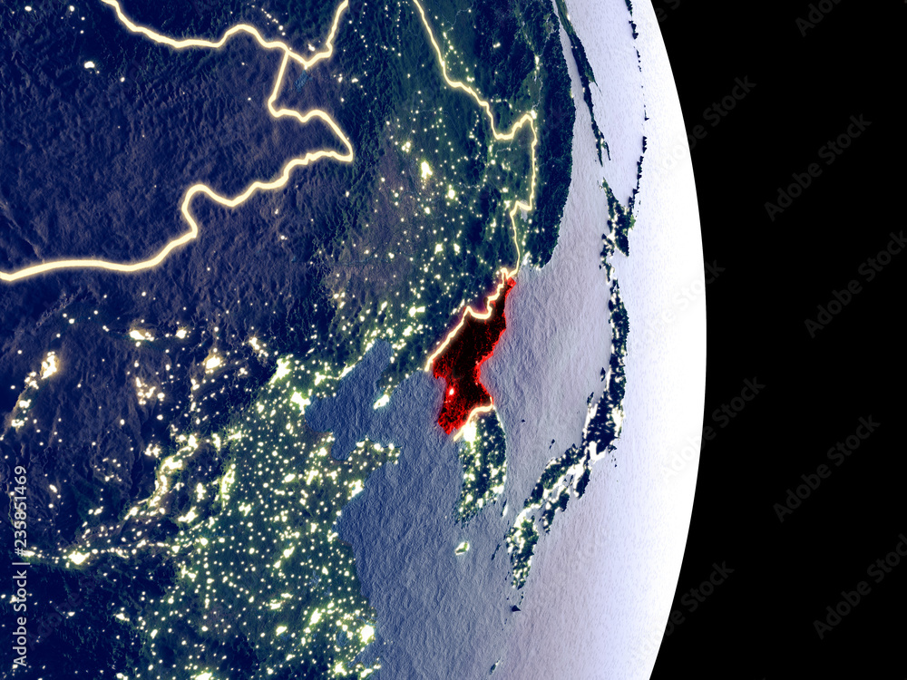 Satellite view of North Korea at night with visible bright city lights ...