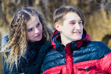 loving young couple in winter in park