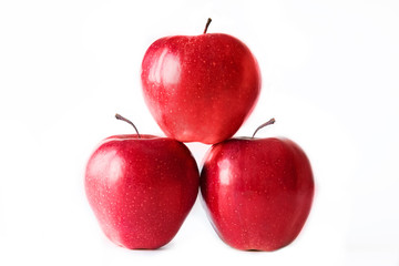 Three red apples on white background. Isolated on white. Healthy eating