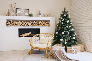 Living room in Scandinavian style with a Christmas decor. Holiday background. New Year