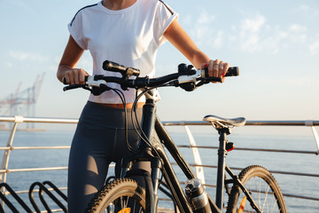 Poster - Cropped image of a young fitness girl